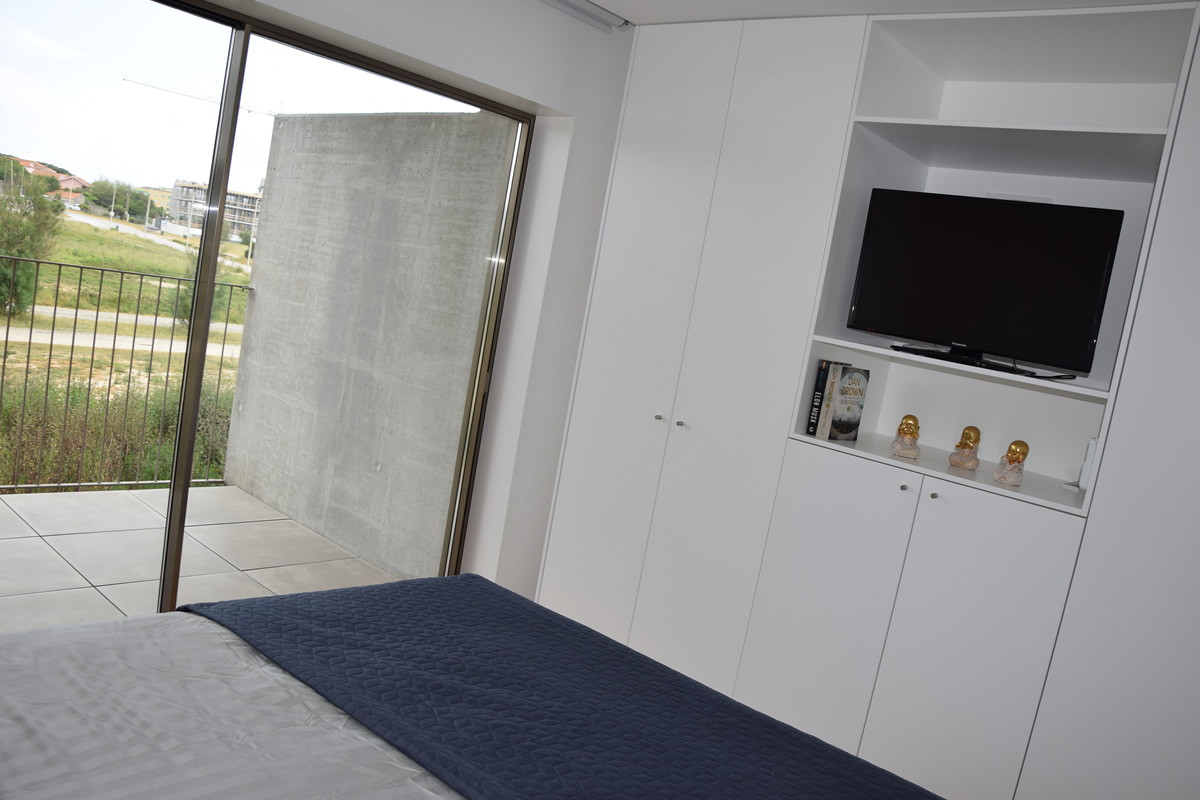 Kingsize bed with ensuite bathroom, private terrace (with electric screens) and TV.