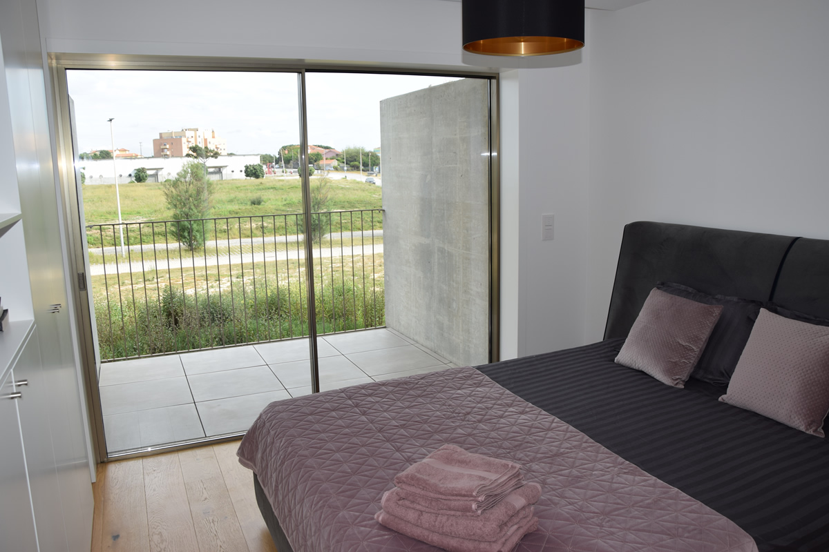 Big second bedroom with Queensize bed, ensuite bathroom and private terrace.